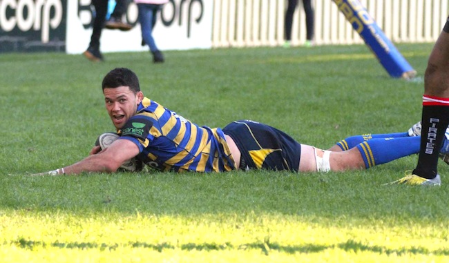 Jake Wainwright slides home for one of his two tries - Photo: AJF Photography